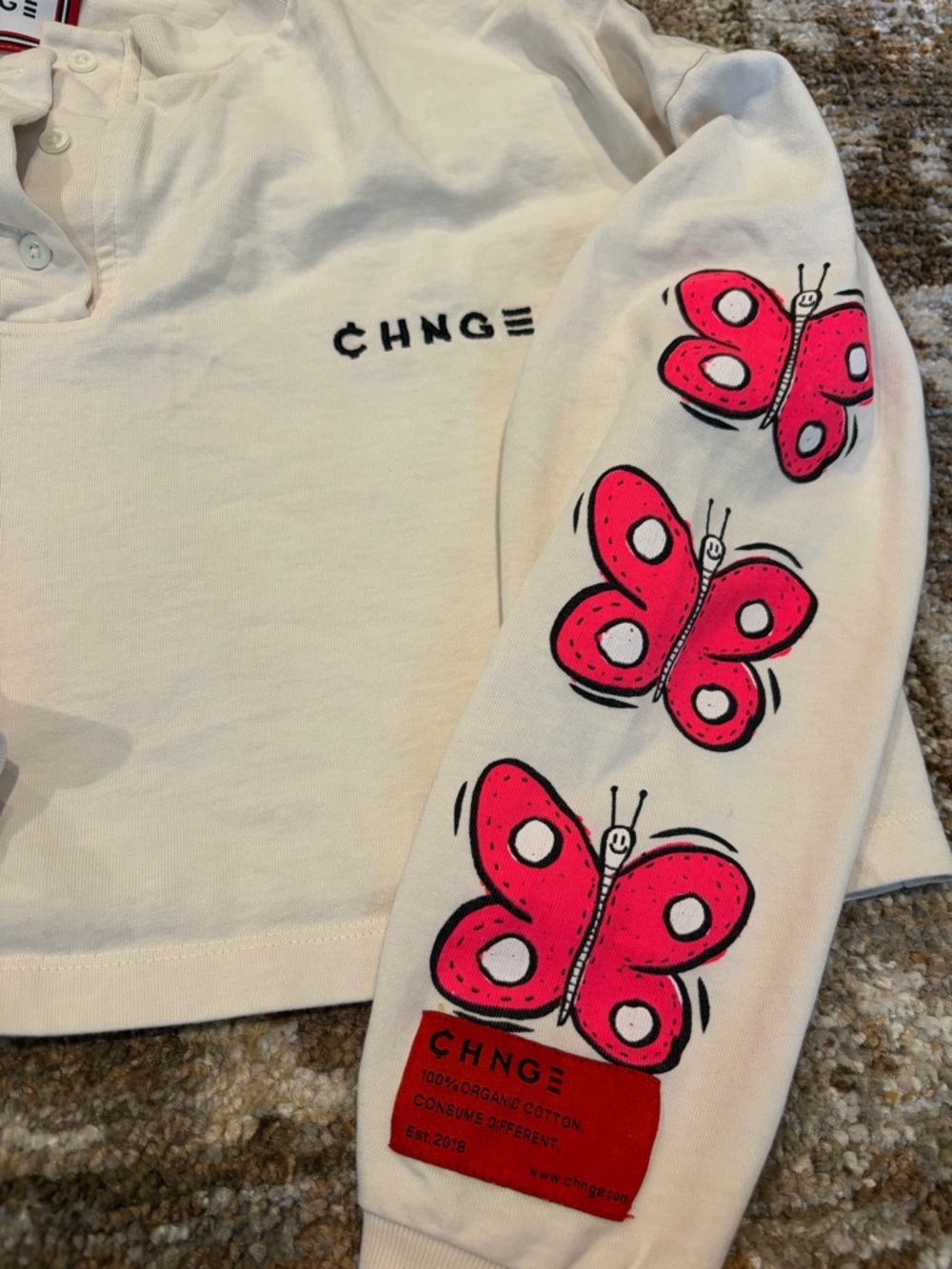 CHNGE Cream Long-Sleeve Henley with Pink Butterfly Sleeve Prints - Picture 2 of 6